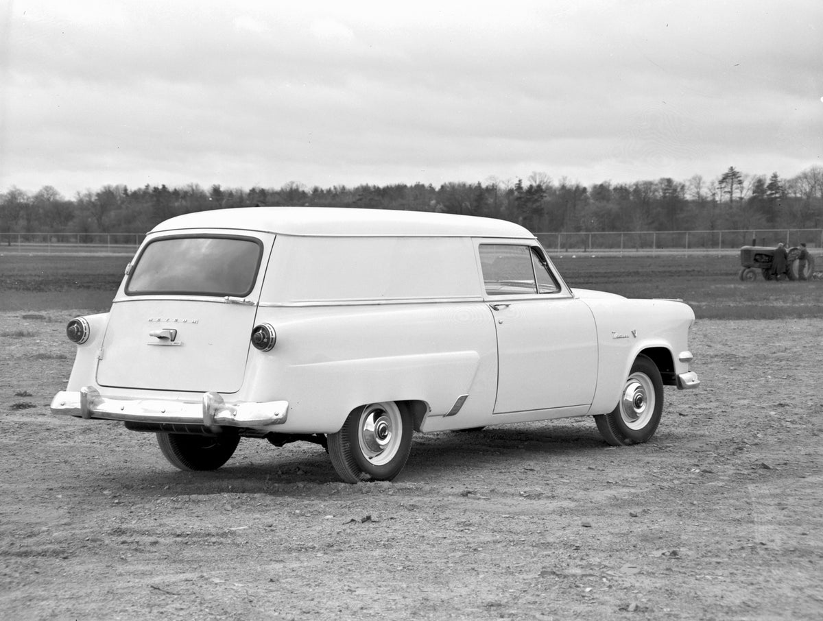 This archival image documents the 1954 Meteor Sedan Delivery rear view on dirt road with scenic trees 541191 and is preserved in the Ford Heritage Vault as part of Ford Motor Company's historic photographic archive. Free for personal, non-commerci...