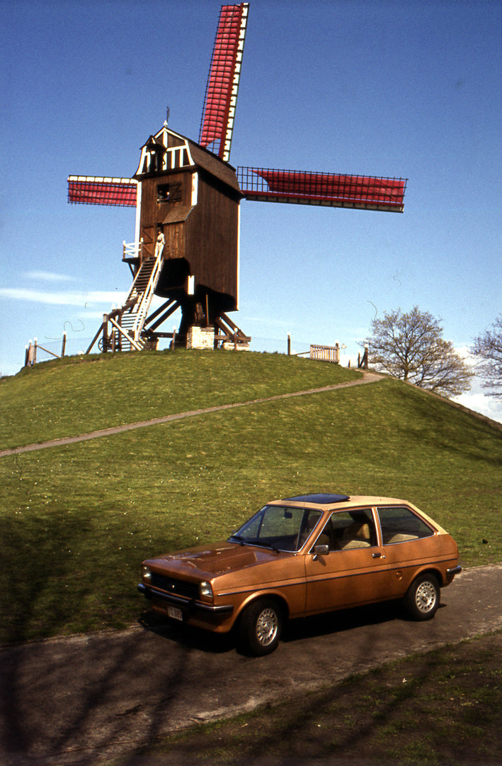 This archival image documents the 1977 Ford Fiesta Mark I on scenic road with windmill and is preserved in the Ford Heritage Vault as part of Ford Motor Company's historic photographic archive. Free for personal, non-commercial use. Ford Heritage ...