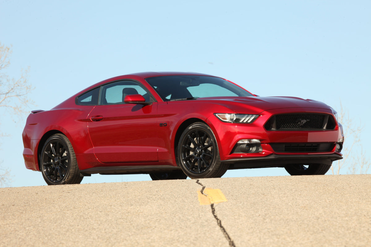 This archival image documents the 2016 Ford Mustang GT Coupe and is preserved in the Ford Heritage Vault as part of Ford Motor Company's historic photographic archive. Free for personal, non-commercial use. Ford Heritage Vault reference AR-2008-8....