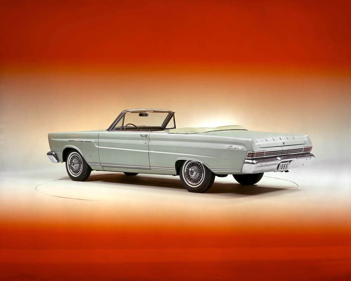 This archival image documents the 1965 Mercury Comet Caliente convertible Back Angle and is preserved in the Ford Heritage Vault as part of Ford Motor Company's historic photographic archive. Free for personal, non-commercial use. Ford Heritage Va...