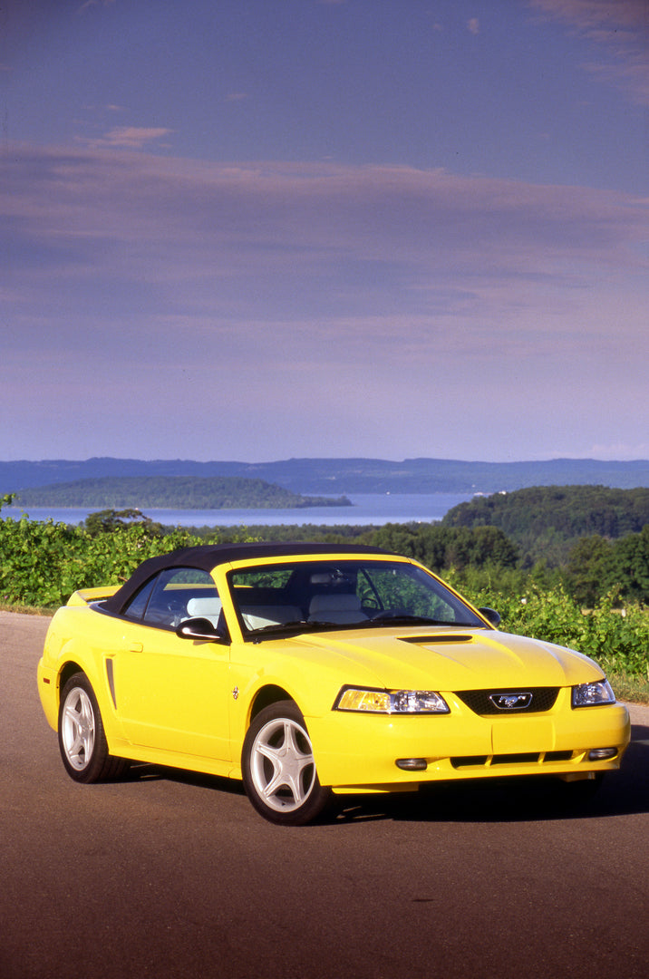 This archival image documents the 1999 Ford Mustang convertible and is preserved in the Ford Heritage Vault as part of Ford Motor Company's historic photographic archive. Free for personal, non-commercial use. Ford Heritage Vault reference AR-2008...