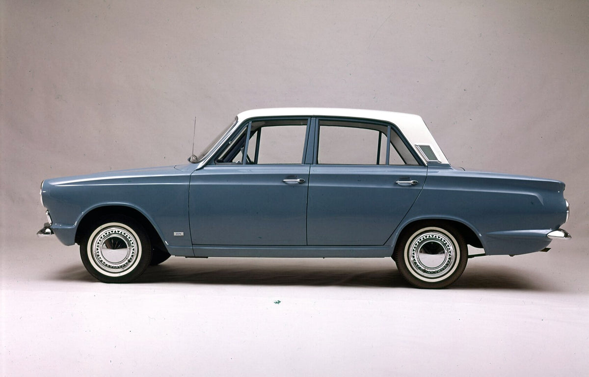 This archival image documents the 1965 Ford Cortina MK I Deluxe side view in studio and is preserved in the Ford Heritage Vault as part of Ford Motor Company's historic photographic archive. Free for personal, non-commercial use. Ford Heritage Vau...