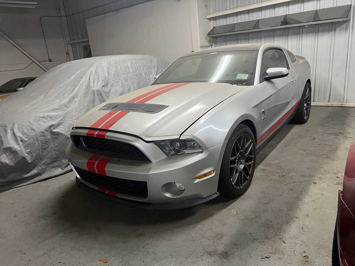 This archival image documents the 2012 Ford Mustang Shelby GT500 and is preserved in the Ford Heritage Vault as part of Ford Motor Company's historic photographic archive. Free for personal, non-commercial use. Ford Heritage Vault reference AR-202...