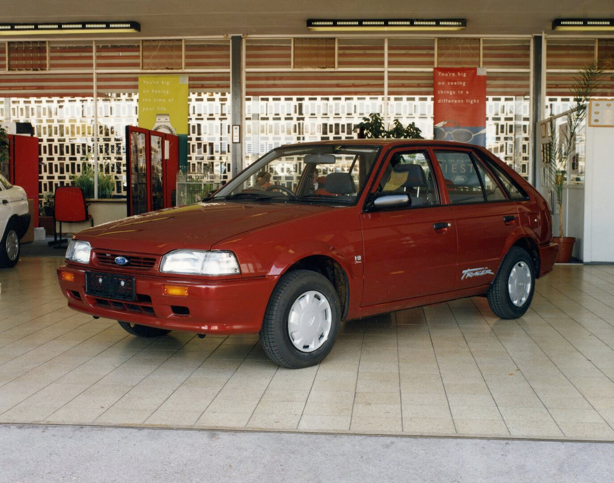 This archival image documents the 1998 Ford Tracer 1.3i Plus display AR-2002-210284.7.27.1 and is preserved in the Ford Heritage Vault as part of Ford Motor Company's historic photographic archive. Free for personal, non-commercial use. Ford Herit...