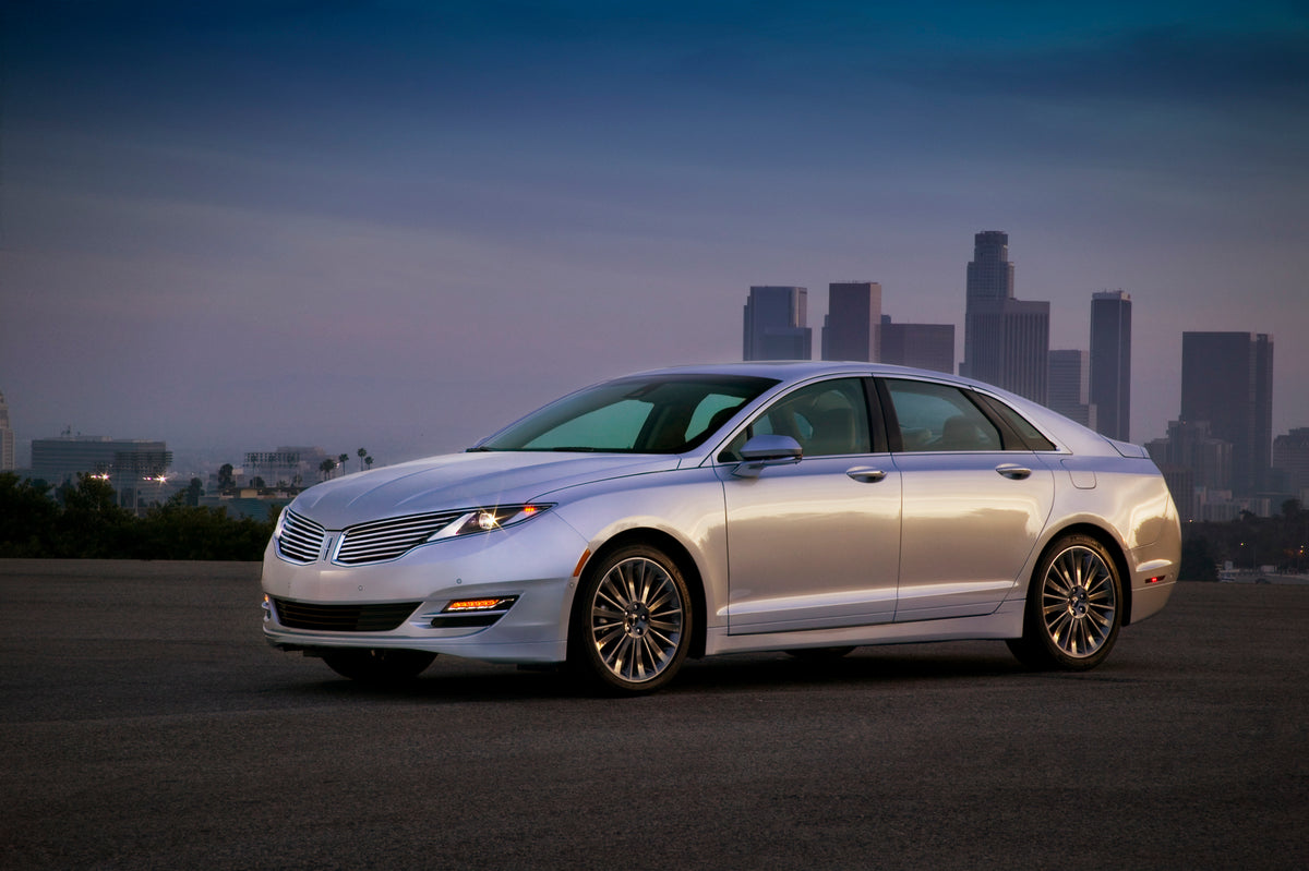 This archival image documents the 2013 Lincoln MKZ and is preserved in the Ford Heritage Vault as part of Ford Motor Company's historic photographic archive. Free for personal, non-commercial use. Ford Heritage Vault reference AR-2008-8.1.1.2268.