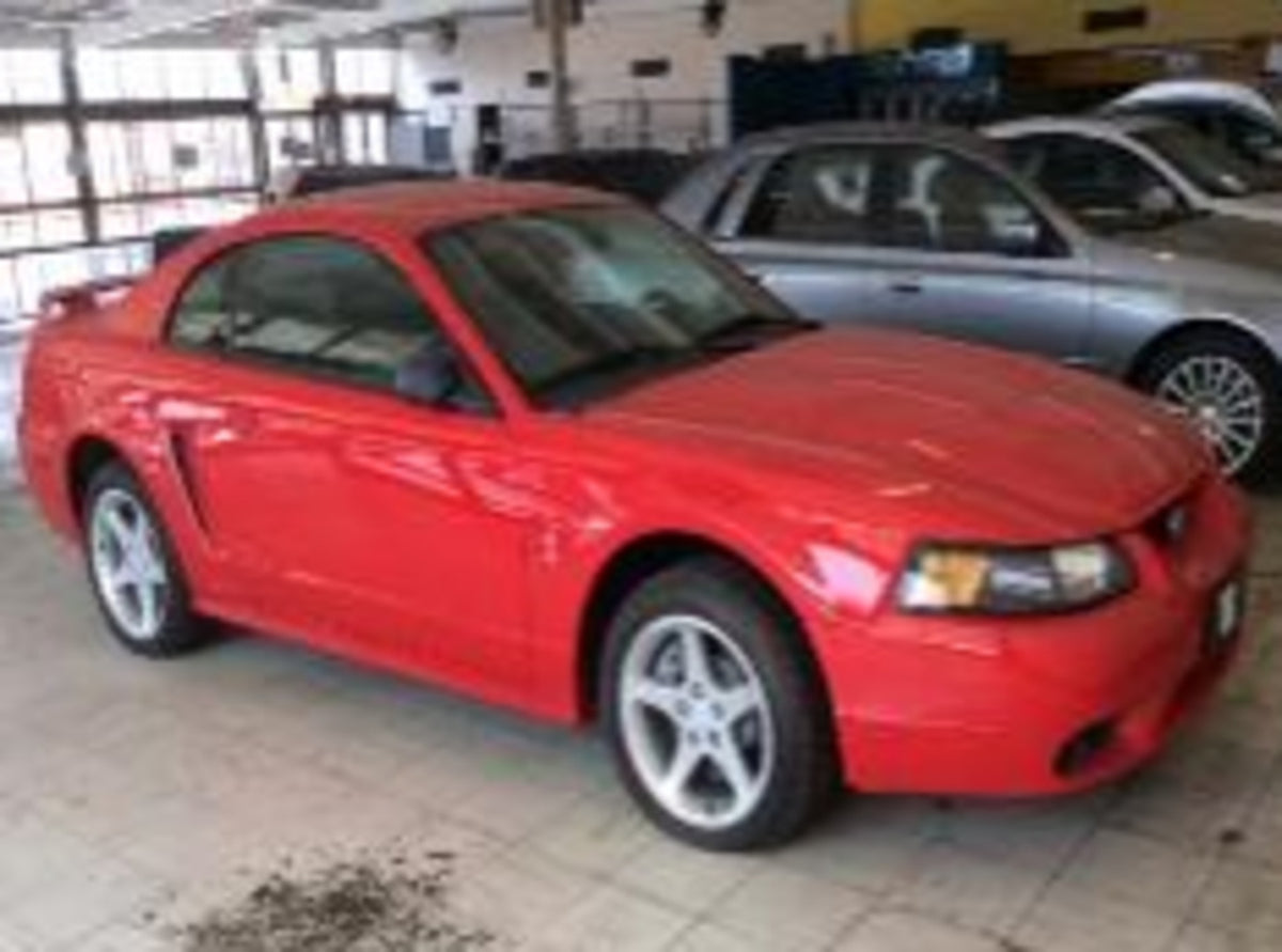 This archival image documents the 2001 Ford Mustang and is preserved in the Ford Heritage Vault as part of Ford Motor Company's historic photographic archive. Free for personal, non-commercial use. Ford Heritage Vault reference AR-2024-9.1.1.16.