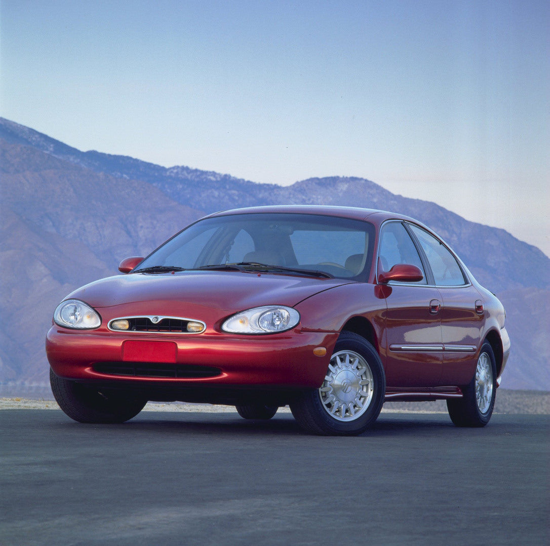 This archival image documents the 1996 Mercury Sable front angle with mountains in background AR-2002-213709-150 and is preserved in the Ford Heritage Vault as part of Ford Motor Company's historic photographic archive. Free for personal, non-comm...