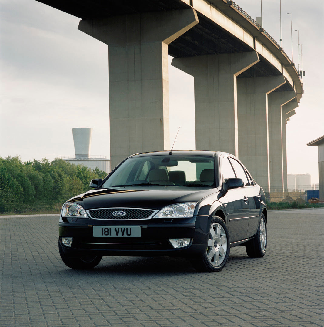 This archival image documents the 2003 Ford Mondeo Mark II under scenic bridge and is preserved in the Ford Heritage Vault as part of Ford Motor Company's historic photographic archive. Free for personal, non-commercial use. Ford Heritage Vault re...