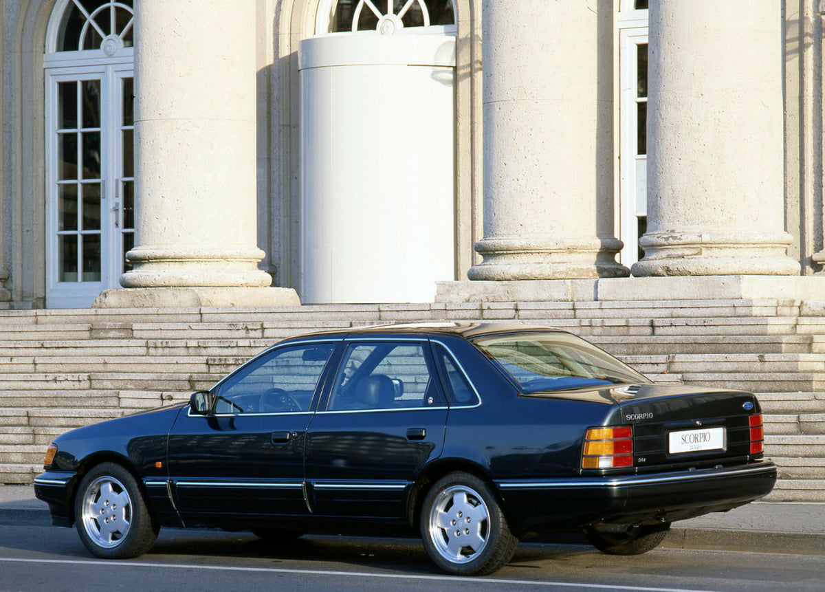 This archival image documents the 1990 Ford Scorpio 24 Valve Mark I in front of building and is preserved in the Ford Heritage Vault as part of Ford Motor Company's historic photographic archive. Free for personal, non-commercial use. Ford Heritag...