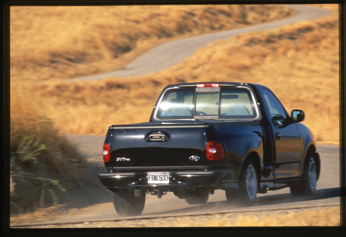 This archival image documents the 1999 Ford SVT F-150 Lightning and is preserved in the Ford Heritage Vault as part of Ford Motor Company's historic photographic archive. Free for personal, non-commercial use. Ford Heritage Vault reference AR-2008...