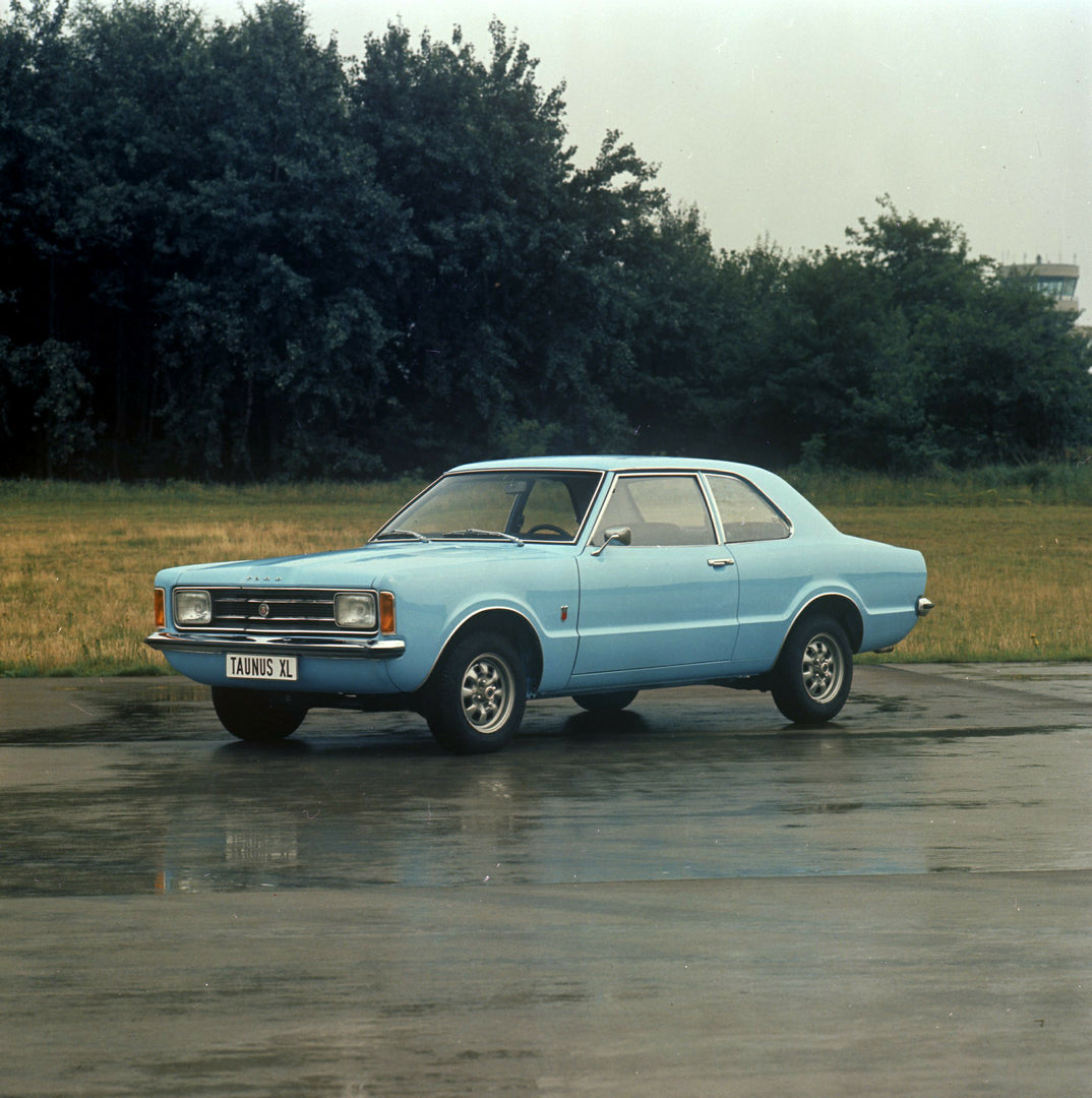 This archival image documents the 1974 Ford Taunus XL with scenic trees and is preserved in the Ford Heritage Vault as part of Ford Motor Company's historic photographic archive. Free for personal, non-commercial use. Ford Heritage Vault reference...