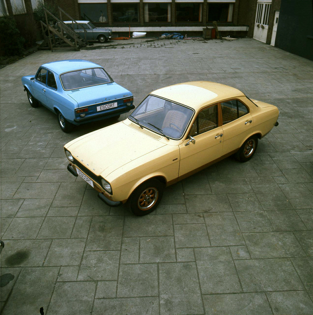 This archival image documents the 1974 Ford Escort Mark I LHD sedans aerial view on pavement and is preserved in the Ford Heritage Vault as part of Ford Motor Company's historic photographic archive. Free for personal, non-commercial use. Ford Her...