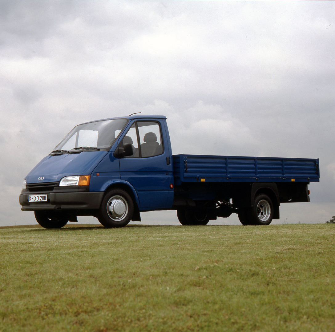 This archival image documents the 1991 Ford Transit Mark III Chassis Cab LHD in scenic field and is preserved in the Ford Heritage Vault as part of Ford Motor Company's historic photographic archive. Free for personal, non-commercial use. Ford Her...