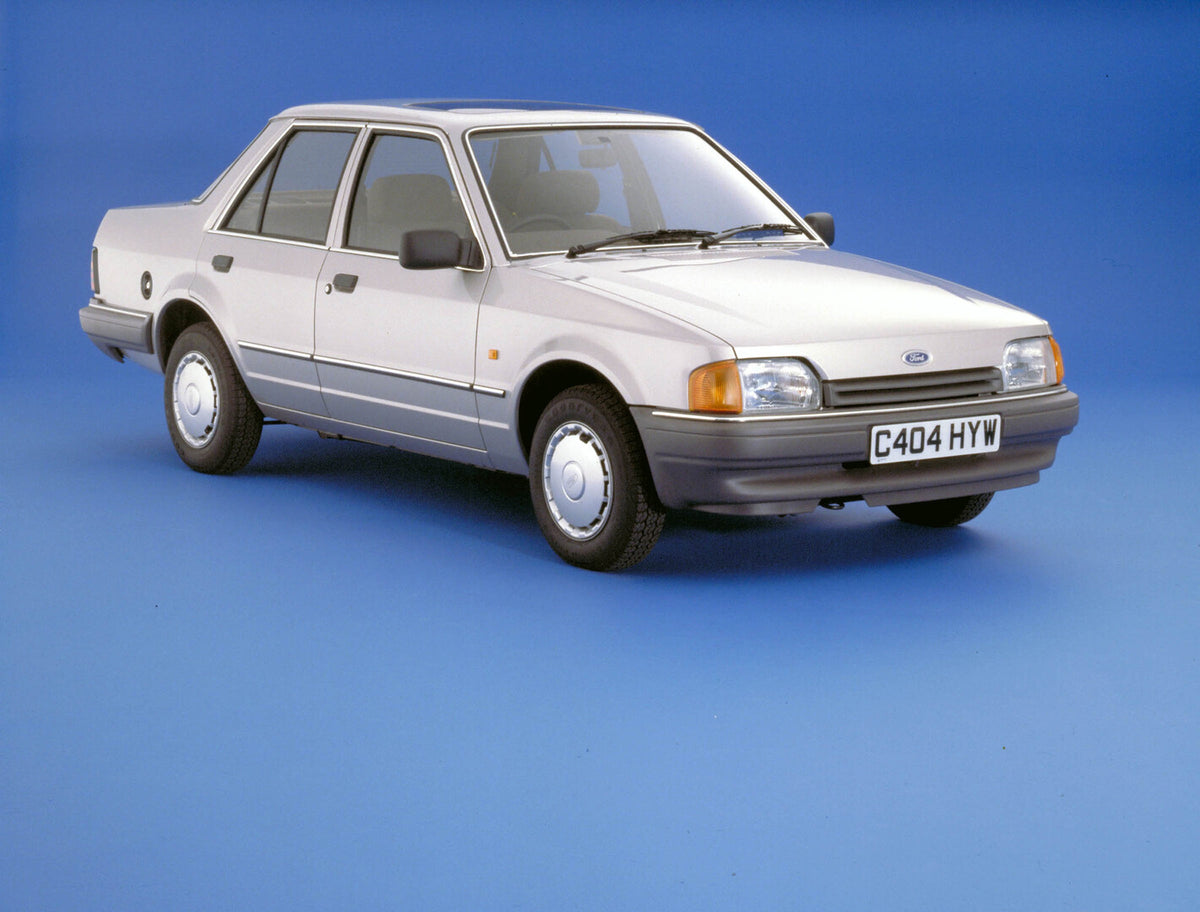 This archival image documents the 1986 Ford Orion 1.6 GL MK II front 3/4 view in studio d1009 and is preserved in the Ford Heritage Vault as part of Ford Motor Company's historic photographic archive. Free for personal, non-commercial use. Ford He...
