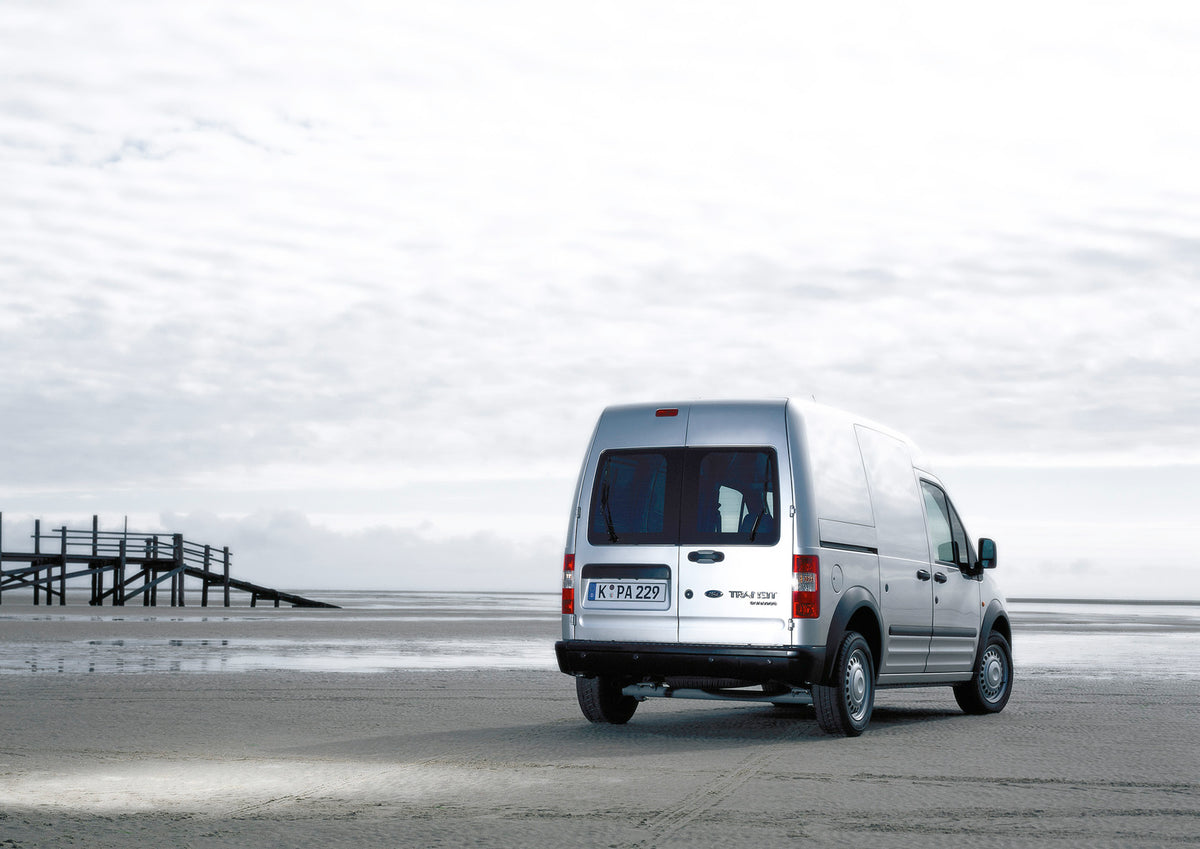 This archival image documents the 2002 Ford Transit Connect rear view on scenic beach and is preserved in the Ford Heritage Vault as part of Ford Motor Company's historic photographic archive. Free for personal, non-commercial use. Ford Heritage V...