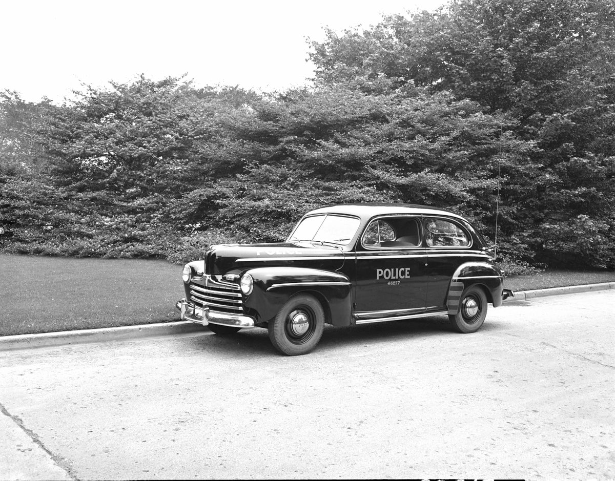 This archival image documents the 1946 Ford Super Deluxe Detroit Police car and is preserved in the Ford Heritage Vault as part of Ford Motor Company's historic photographic archive. Free for personal, non-commercial use. Ford Heritage Vault refer...