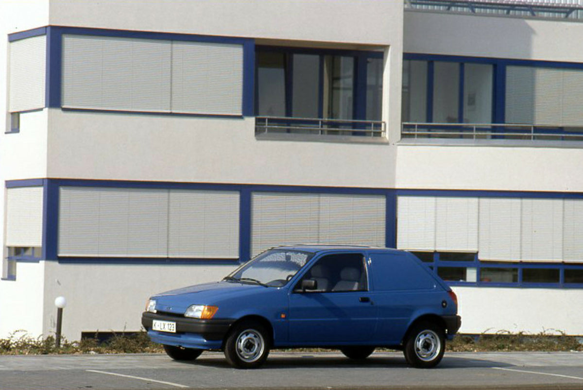 This archival image documents the 1989 Ford Fiesta Mark III Van side view closeup in front of building and is preserved in the Ford Heritage Vault as part of Ford Motor Company's historic photographic archive. Free for personal, non-commercial use...