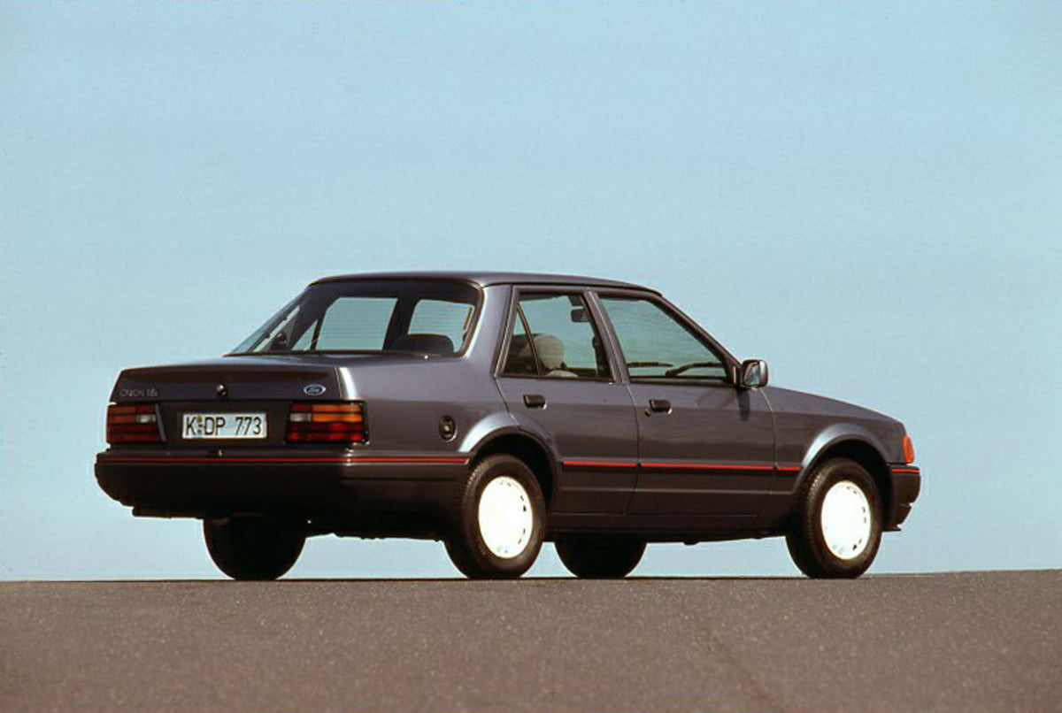 This archival image documents the 1989 Ford Orion Mark II LHD rear view with scenic blue sky and is preserved in the Ford Heritage Vault as part of Ford Motor Company's historic photographic archive. Free for personal, non-commercial use. Ford Her...