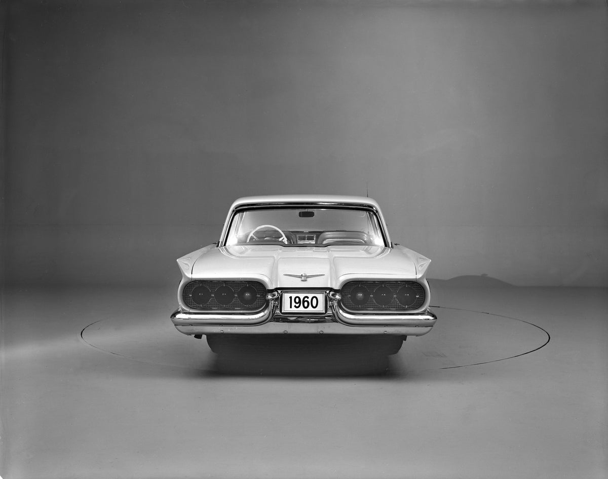 This archival image documents the 1960 Ford Thunderbird rear view in studio and is preserved in the Ford Heritage Vault as part of Ford Motor Company's historic photographic archive. Free for personal, non-commercial use. Ford Heritage Vault refer...
