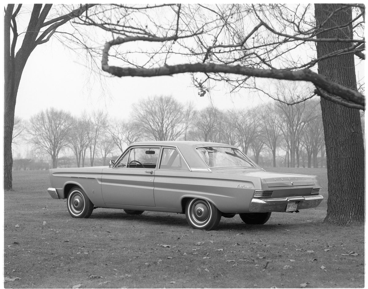 This archival image documents the 1965 Mercury Comet 202 two door sedan and is preserved in the Ford Heritage Vault as part of Ford Motor Company's historic photographic archive. Free for personal, non-commercial use. Ford Heritage Vault reference...