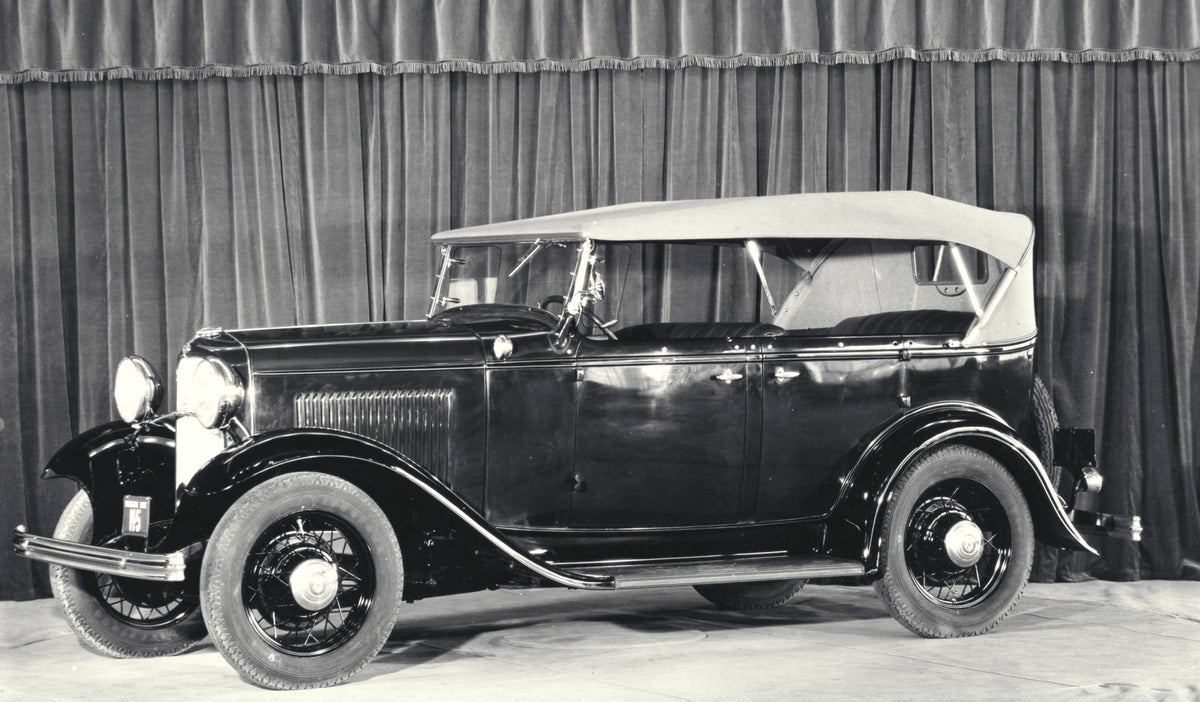 This archival image documents the 1932 Ford DeLuxe Phaeton and is preserved in the Ford Heritage Vault as part of Ford Motor Company's historic photographic archive. Free for personal, non-commercial use. Ford Heritage Vault reference AR-2008-8.1....