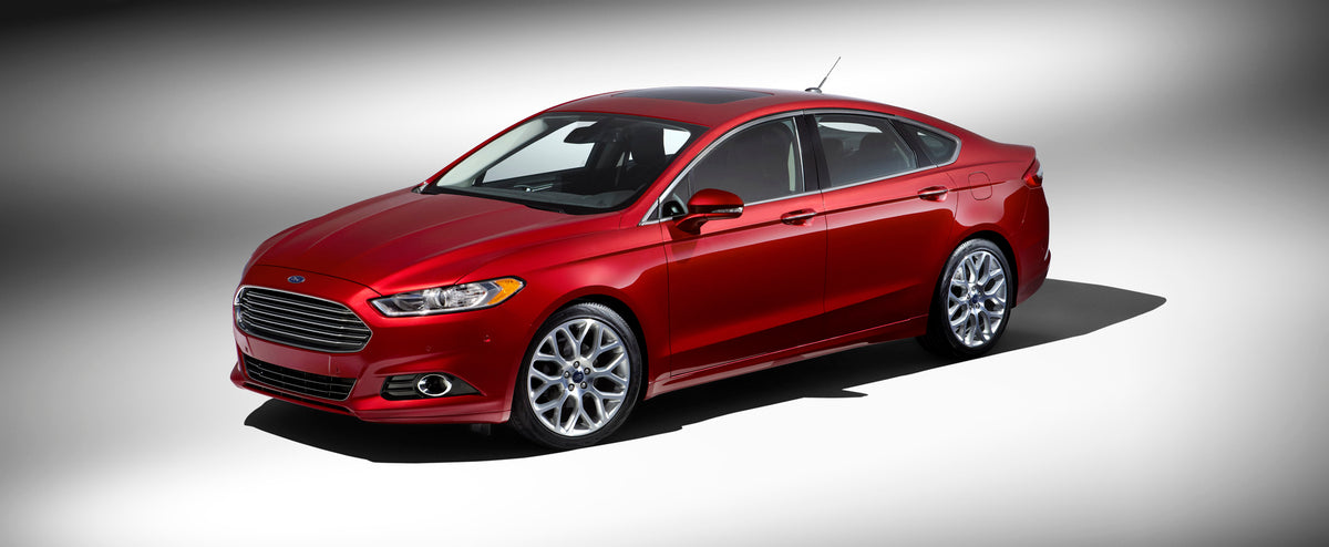 This archival image documents the 2013 Ford Fusion studio shot and is preserved in the Ford Heritage Vault as part of Ford Motor Company's historic photographic archive. Free for personal, non-commercial use. Ford Heritage Vault reference AR-2008-...