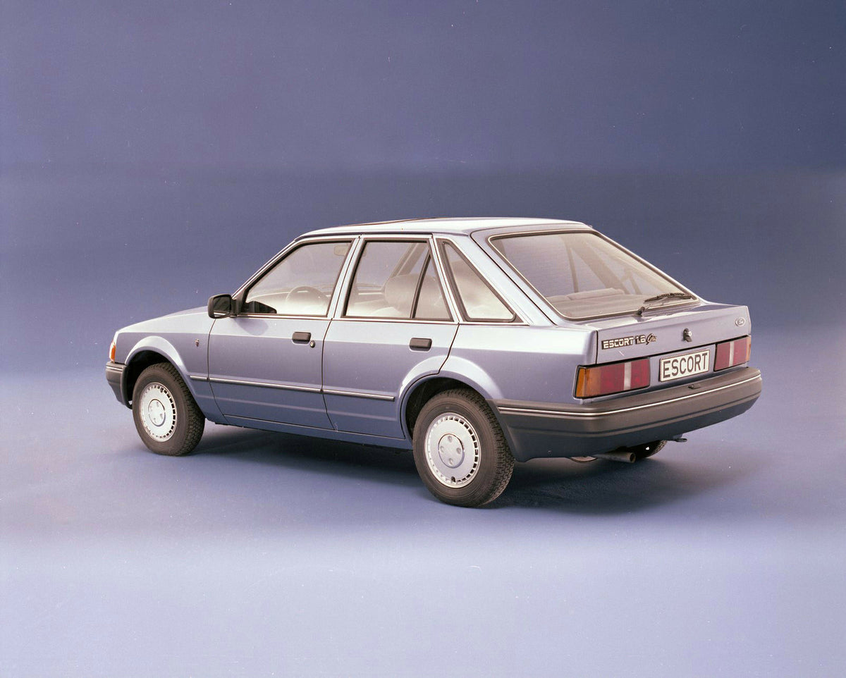 This archival image documents the 1986 Ford Escort Mark IV 1.6 Ghia LHD rear view in studio and is preserved in the Ford Heritage Vault as part of Ford Motor Company's historic photographic archive. Free for personal, non-commercial use. Ford Heri...