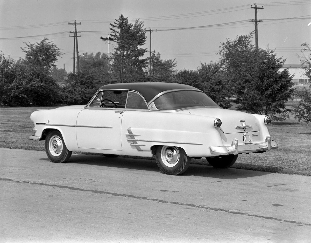 This archival image documents the 1953 Meteor Crestline Victoria Coupe rear view on scenic road AR-2007-5 and is preserved in the Ford Heritage Vault as part of Ford Motor Company's historic photographic archive. Free for personal, non-commercial ...