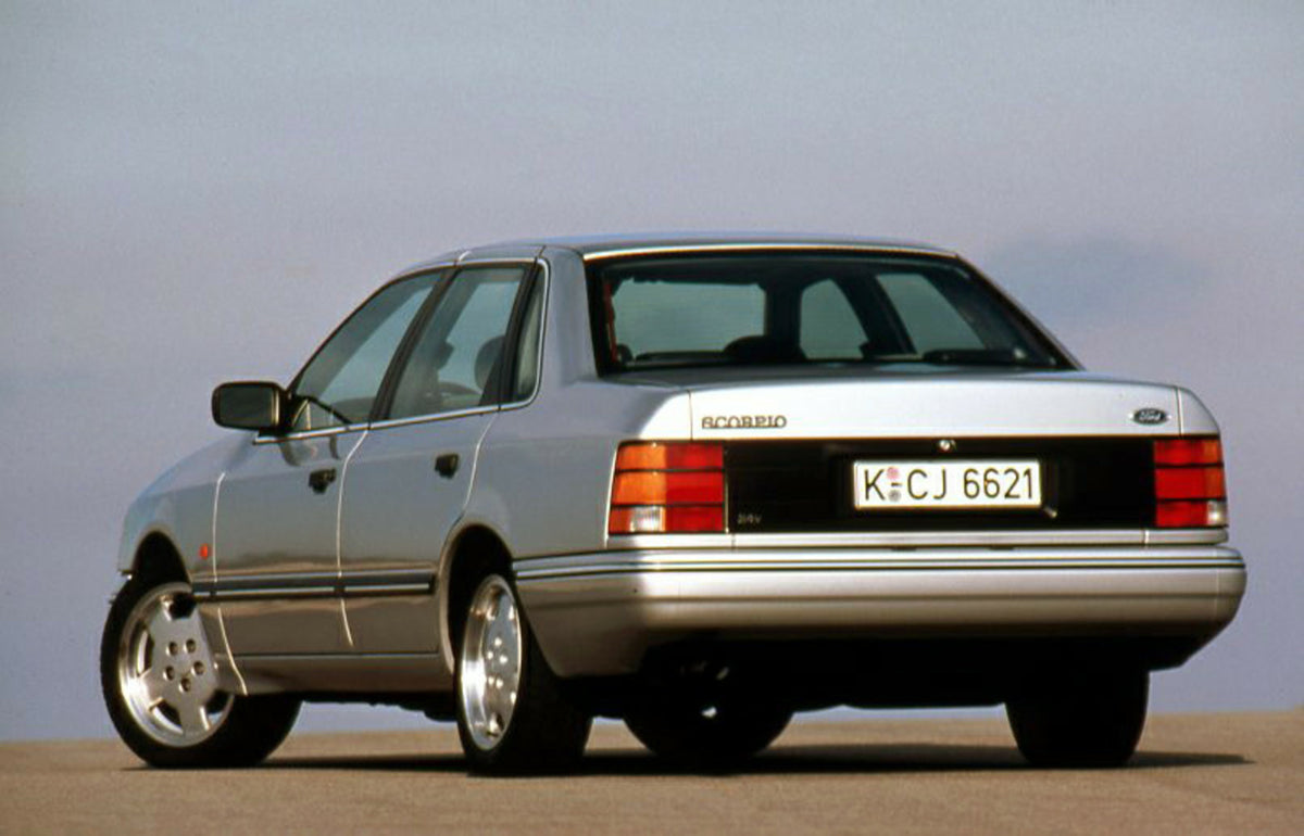 This archival image documents the 1991 Ford Scorpio Mark I rear angled view and is preserved in the Ford Heritage Vault as part of Ford Motor Company's historic photographic archive. Free for personal, non-commercial use. Ford Heritage Vault refer...