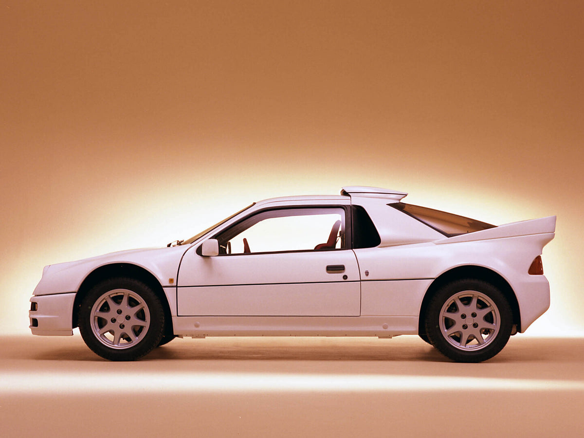 This archival image documents the 1985 Ford RS200 side view in studio 1985-836-23 and is preserved in the Ford Heritage Vault as part of Ford Motor Company's historic photographic archive. Free for personal, non-commercial use. Ford Heritage Vault...