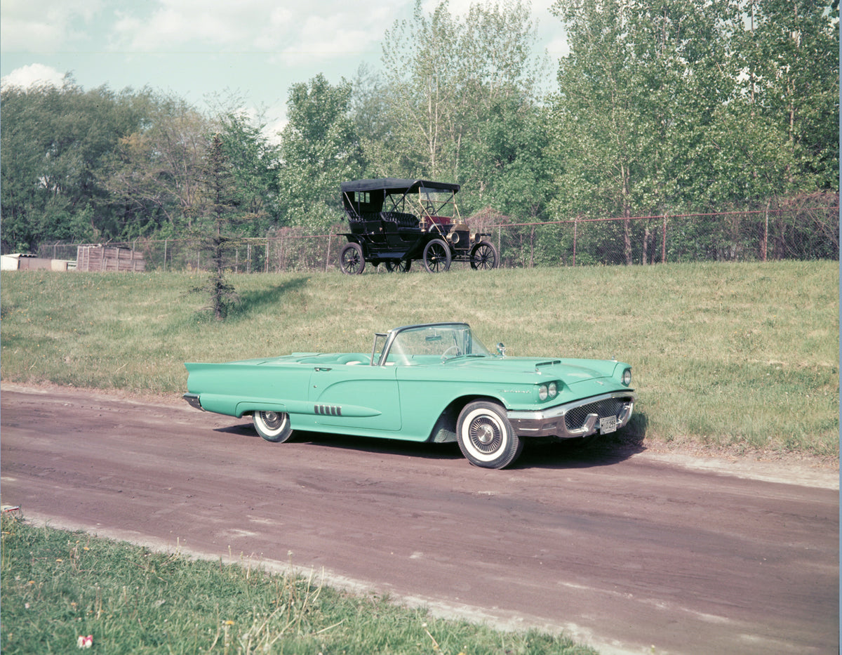 This archival image documents the 1958 Ford Thunderbird and circa 1908 Ford Model T and is preserved in the Ford Heritage Vault as part of Ford Motor Company's historic photographic archive. Free for personal, non-commercial use. Ford Heritage Vau...