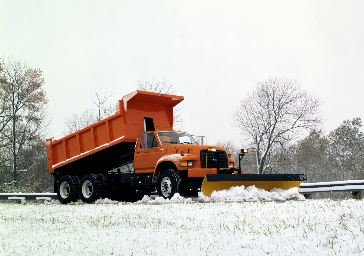 This archival image documents the 1995 Ford F-Series heavy duty snowplow and is preserved in the Ford Heritage Vault as part of Ford Motor Company's historic photographic archive. Free for personal, non-commercial use. Ford Heritage Vault referenc...