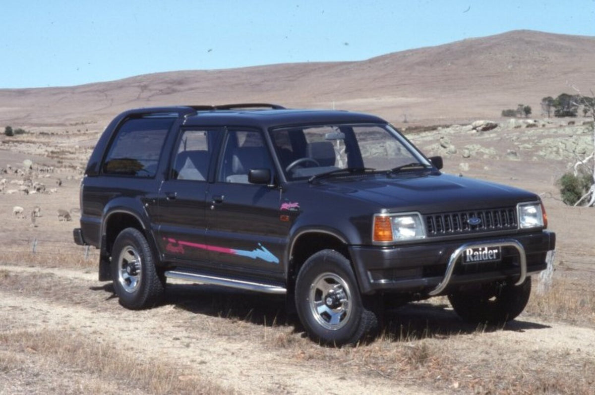 This archival image documents the 1994 Ford Raider on scenic dirt road AR-2002-210284 and is preserved in the Ford Heritage Vault as part of Ford Motor Company's historic photographic archive. Free for personal, non-commercial use. Ford Heritage V...