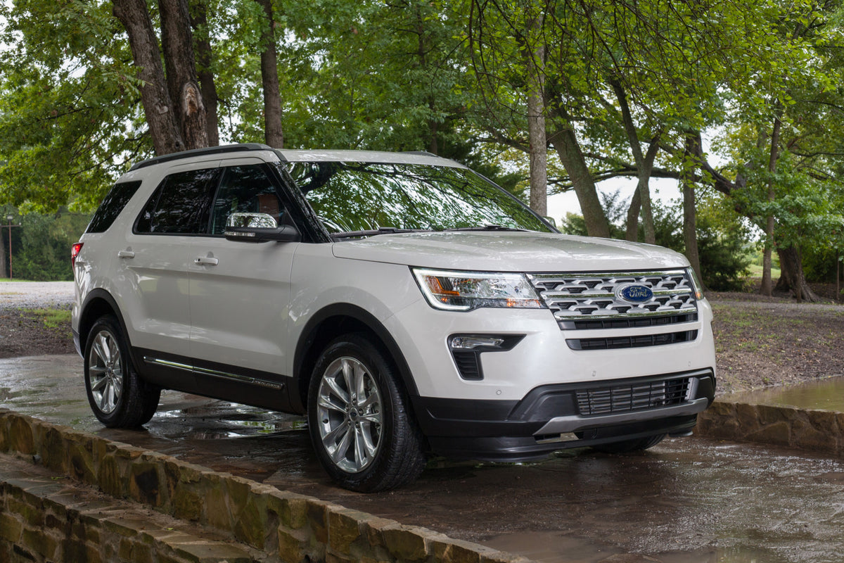 This archival image documents the 2019 Ford Explorer XLT Desert Copper Edition on scenic road and is preserved in the Ford Heritage Vault as part of Ford Motor Company's historic photographic archive. Free for personal, non-commercial use. Ford He...
