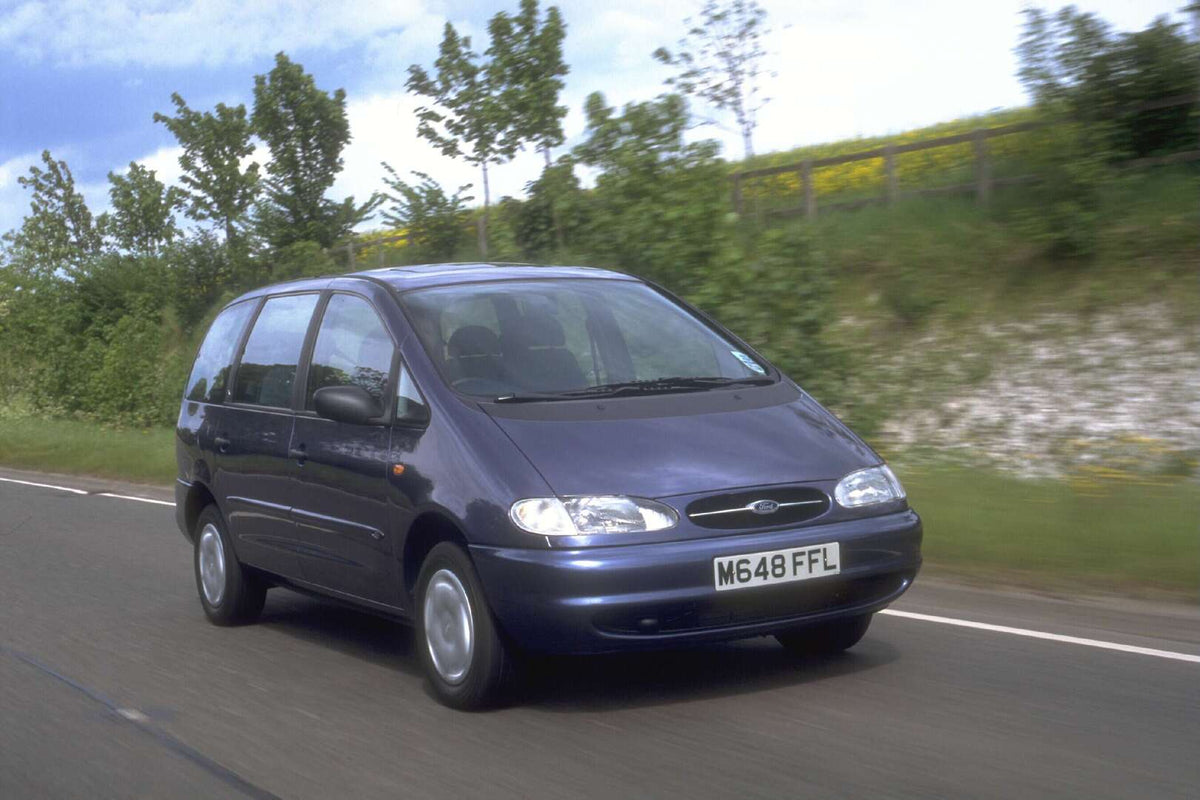 This archival image documents the 1995 Ford Galaxy Mark I GLX action shot on scenic road AR-2002-213709 and is preserved in the Ford Heritage Vault as part of Ford Motor Company's historic photographic archive. Free for personal, non-commercial us...