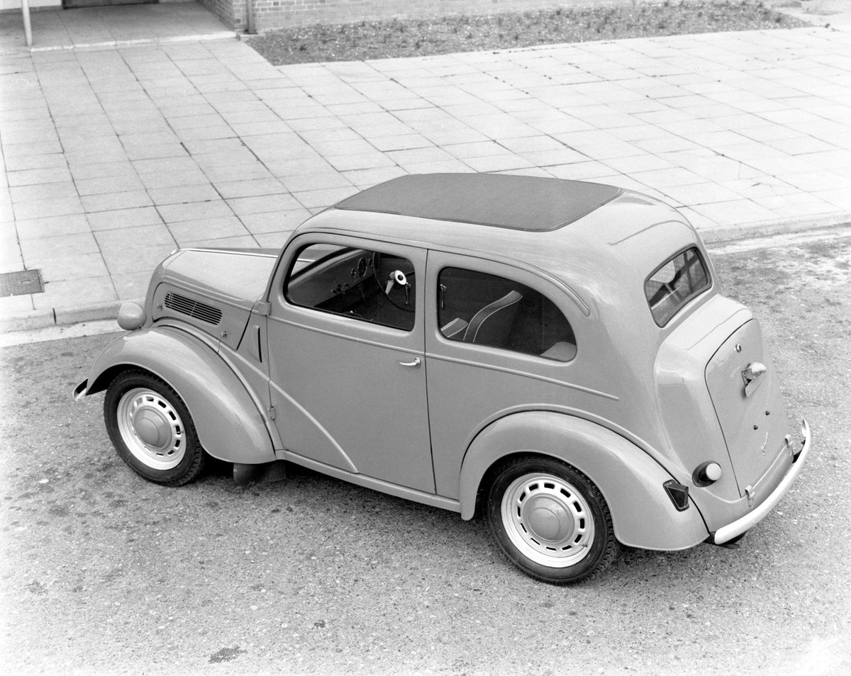 This archival image documents the 1957 Ford Popular at Briggs Sports Ground and is preserved in the Ford Heritage Vault as part of Ford Motor Company's historic photographic archive. Free for personal, non-commercial use. Ford Heritage Vault refer...