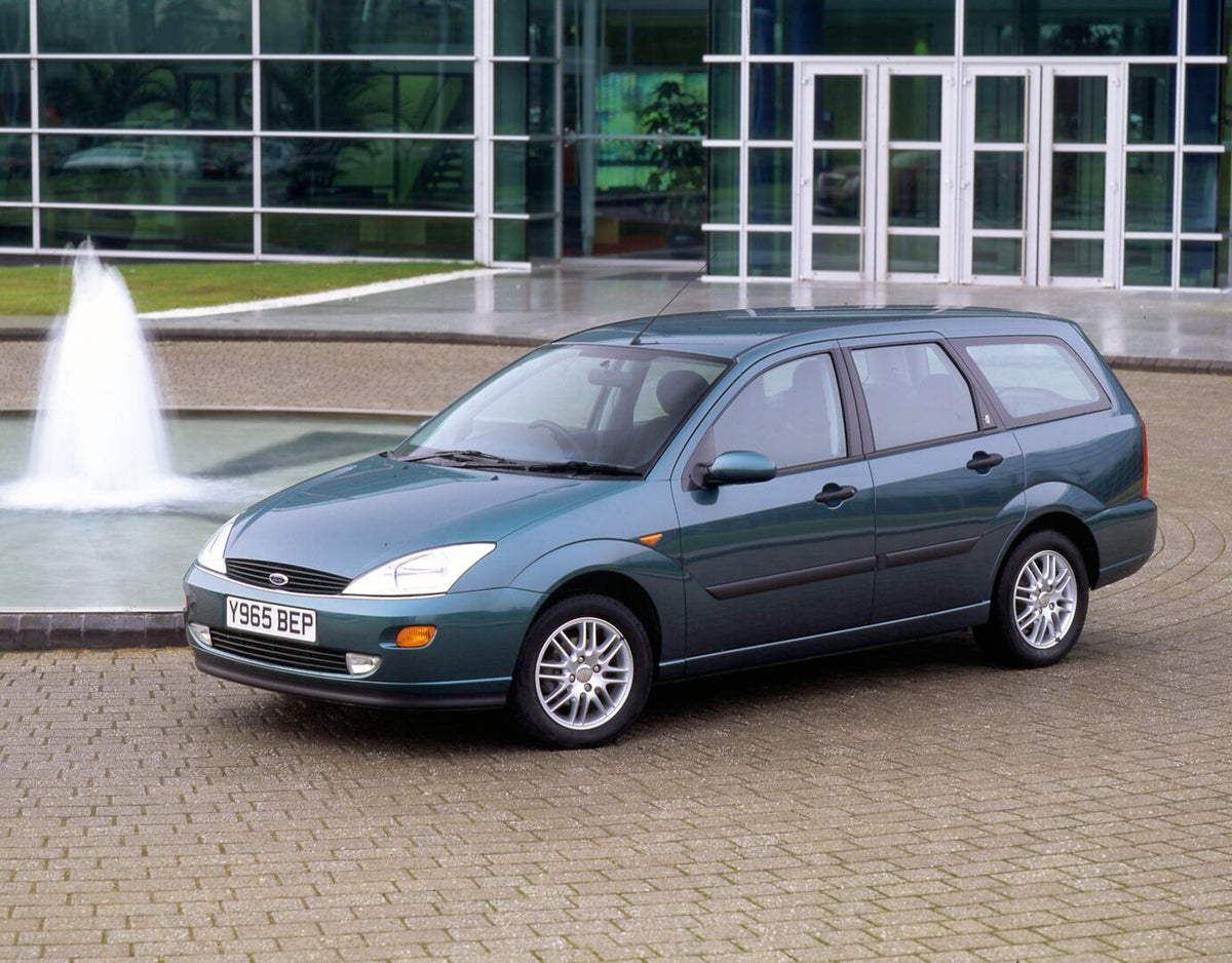 This archival image documents the 2001 Ford Focus Mark I Estate in front of scenic glass building and is preserved in the Ford Heritage Vault as part of Ford Motor Company's historic photographic archive. Free for personal, non-commercial use. For...