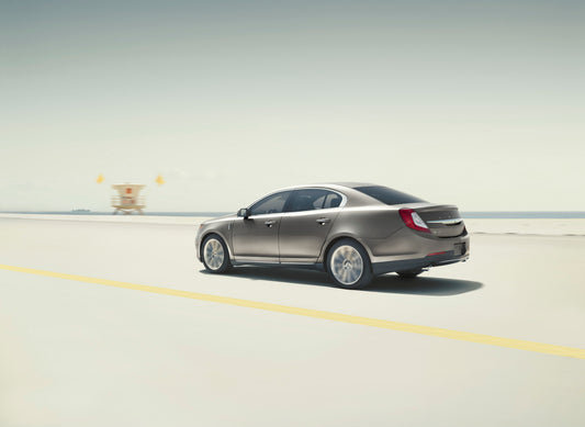 2015 Lincoln MKS action shot on scenic road HV 2015-0055