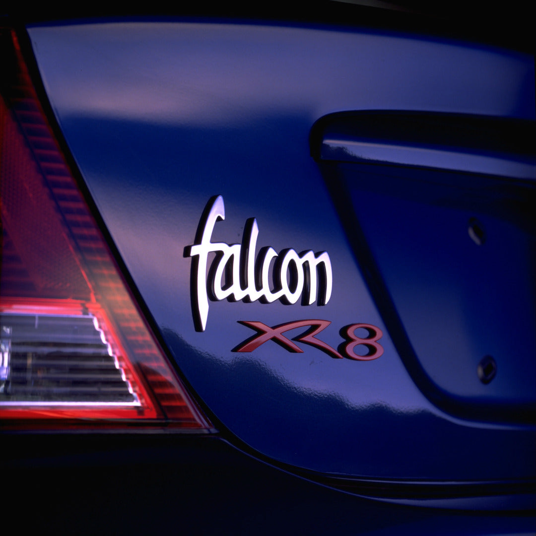This archival image documents the 1998 Ford Falcon XR8 badge closeup and is preserved in the Ford Heritage Vault as part of Ford Motor Company's historic photographic archive. Free for personal, non-commercial use. Ford Heritage Vault reference AR...
