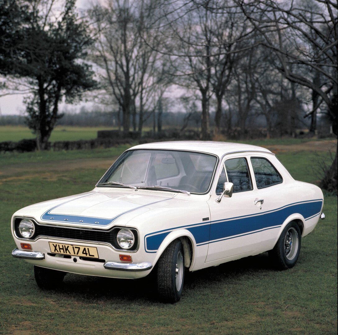 This archival image documents the 1973 Ford Escort Mark I RS 2000 in scenic field with trees 1973-208 and is preserved in the Ford Heritage Vault as part of Ford Motor Company's historic photographic archive. Free for personal, non-commercial use....