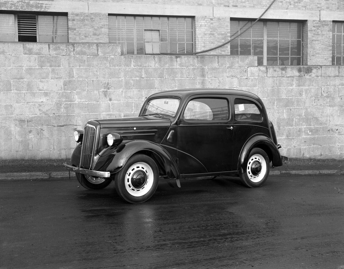 This archival image documents the 1939 Ford Anglia in front of brick wall 10E 22 and is preserved in the Ford Heritage Vault as part of Ford Motor Company's historic photographic archive. Free for personal, non-commercial use. Ford Heritage Vault ...