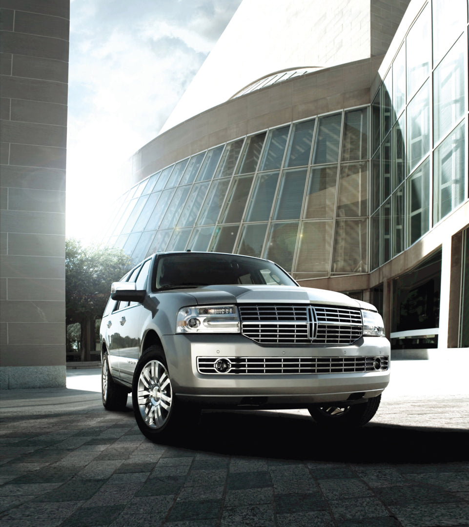 This archival image documents the 2010 Lincoln Navigator with scenic building MS8454 and is preserved in the Ford Heritage Vault as part of Ford Motor Company's historic photographic archive. Free for personal, non-commercial use. Ford Heritage Va...