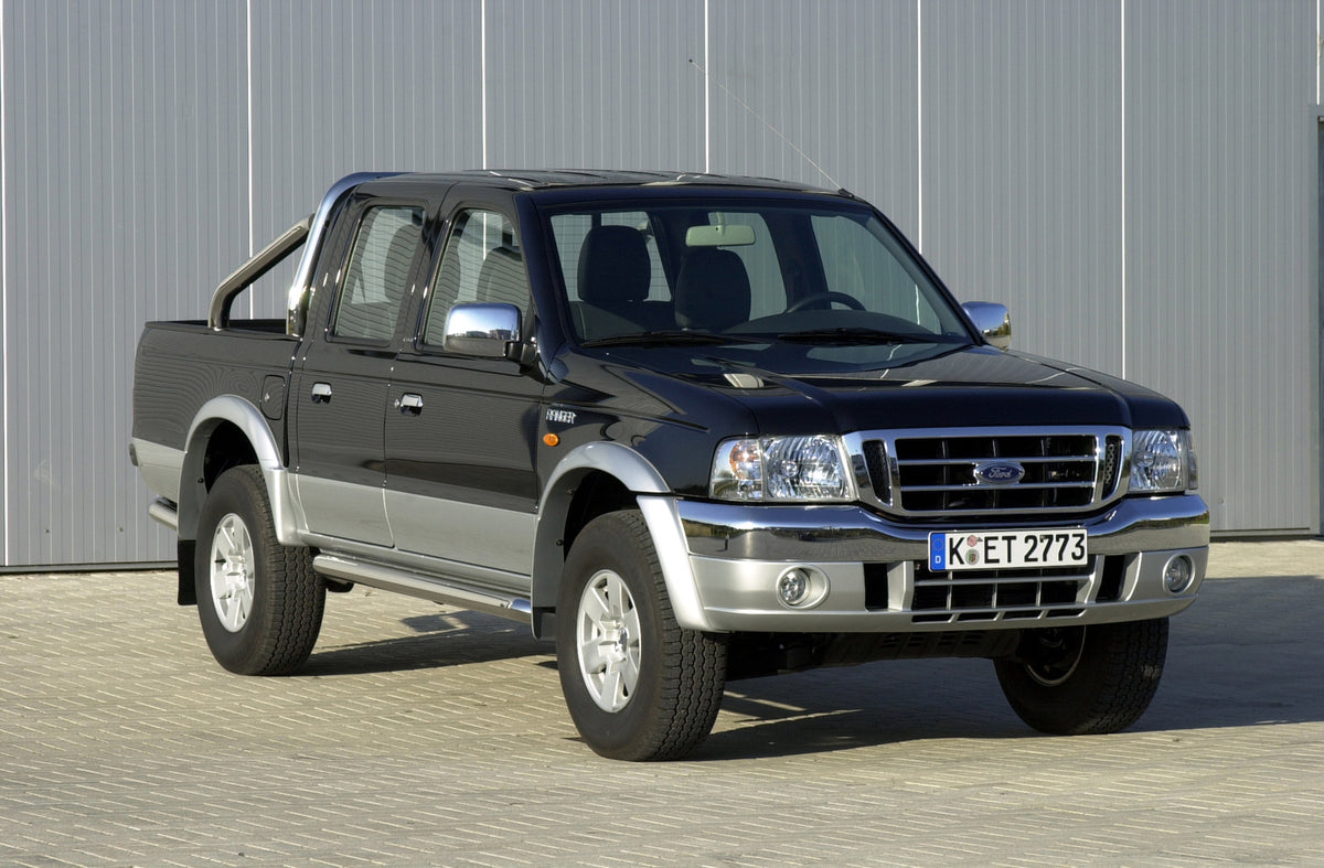 This archival image documents the 2003 Ford Ranger XLT in front of scenic wall and is preserved in the Ford Heritage Vault as part of Ford Motor Company's historic photographic archive. Free for personal, non-commercial use. Ford Heritage Vault re...