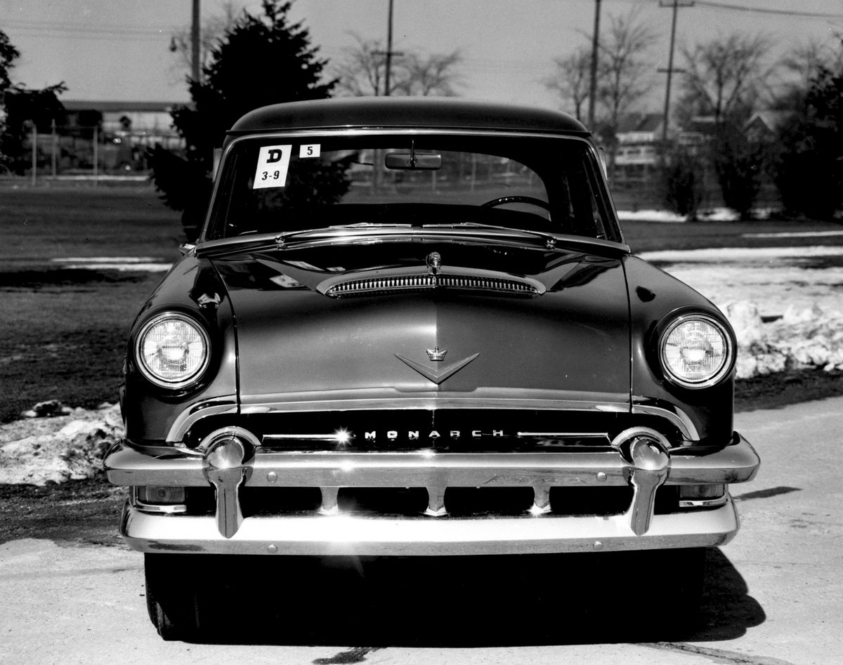This archival image documents the 1954 Monarch Sedan front view on scenic road AR-2007-5 and is preserved in the Ford Heritage Vault as part of Ford Motor Company's historic photographic archive. Free for personal, non-commercial use. Ford Heritag...