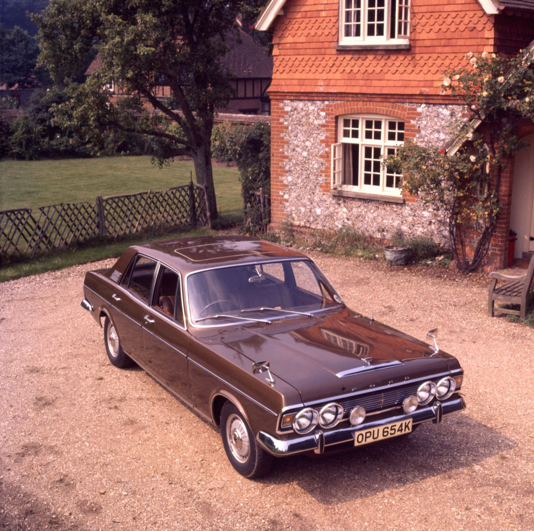 This archival image documents the 1971 Ford Zodiac Mark VI Executive with scenic houses and trees and is preserved in the Ford Heritage Vault as part of Ford Motor Company's historic photographic archive. Free for personal, non-commercial use. For...