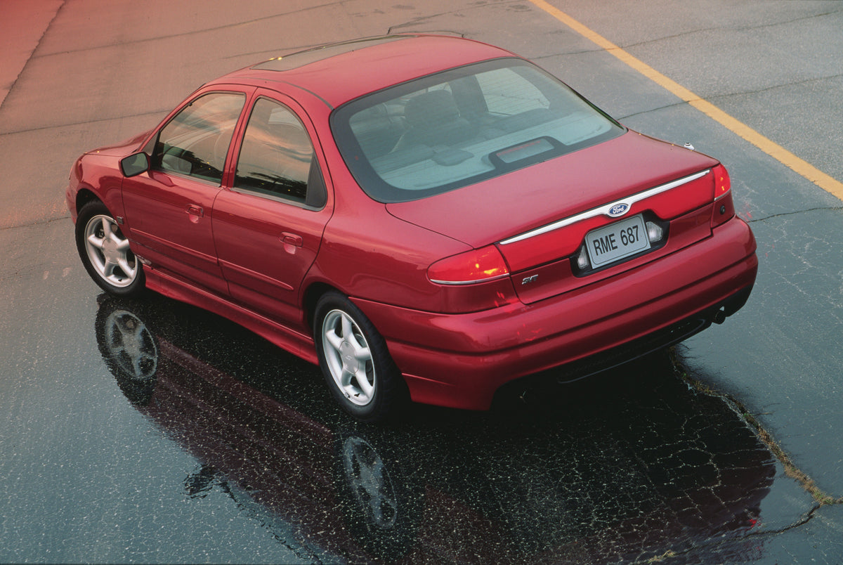 This archival image documents the 1998 Ford Contour SVT and is preserved in the Ford Heritage Vault as part of Ford Motor Company's historic photographic archive. Free for personal, non-commercial use. Ford Heritage Vault reference AR-2008-8.1.2.7...