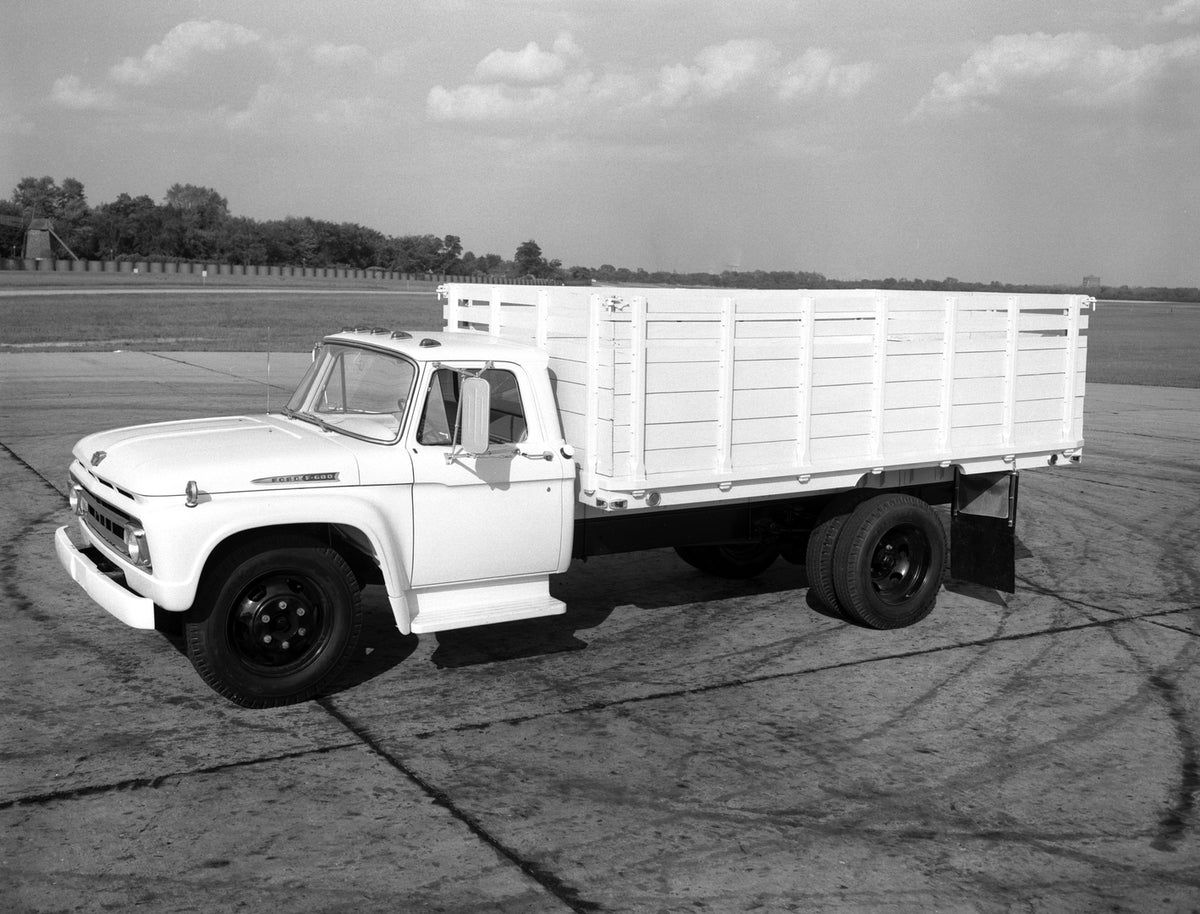 This archival image documents the 1961 Ford F-600 stake bed truck and is preserved in the Ford Heritage Vault as part of Ford Motor Company's historic photographic archive. Free for personal, non-commercial use. Ford Heritage Vault reference AR-20...