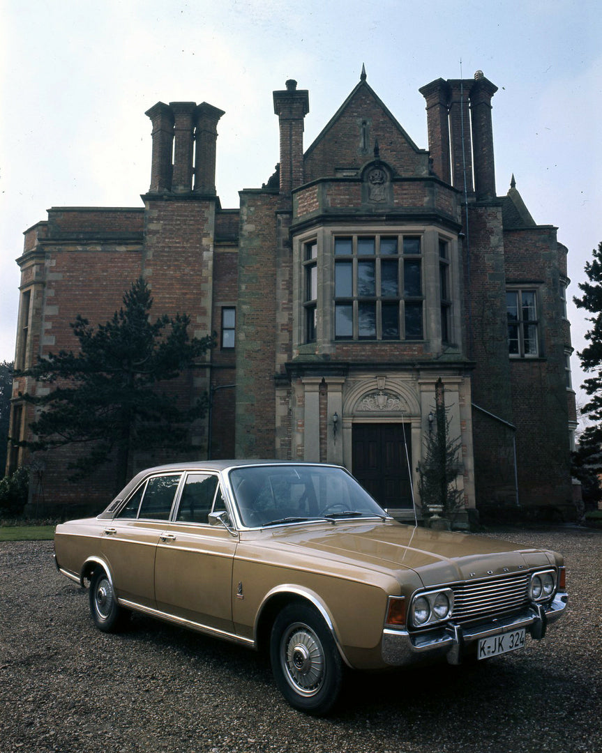 This archival image documents the 1969 Ford Taunus 20M in front of scenic building and is preserved in the Ford Heritage Vault as part of Ford Motor Company's historic photographic archive. Free for personal, non-commercial use. Ford Heritage Vaul...