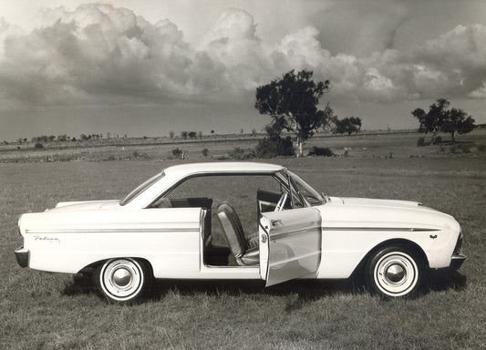 1964 Ford XM Falcon 2 Door Hardtop side view with open doors in scenic field HV 1964-0105