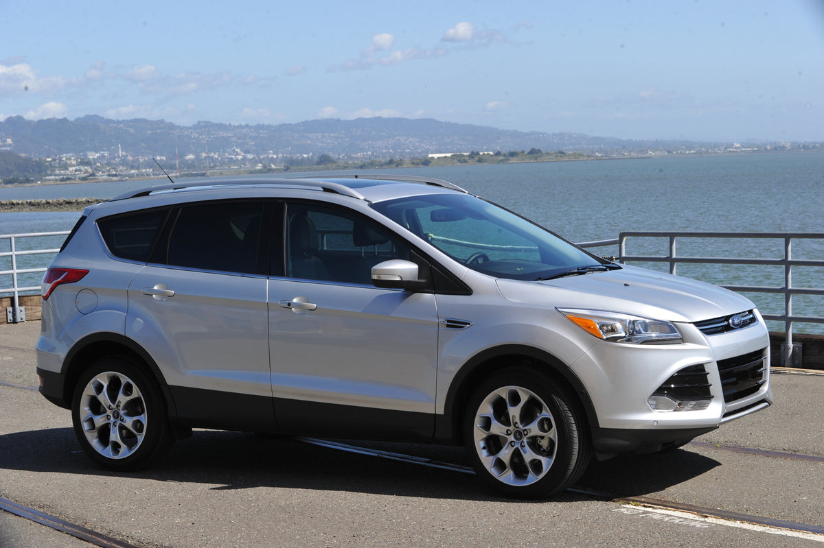 This archival image documents the 2013 Ford Escape scenic overlook and is preserved in the Ford Heritage Vault as part of Ford Motor Company's historic photographic archive. Free for personal, non-commercial use. Ford Heritage Vault reference AR-2...